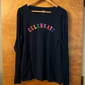 Navy blue GAP long sleeve tea with a colorful “celebrate” graphic on the front